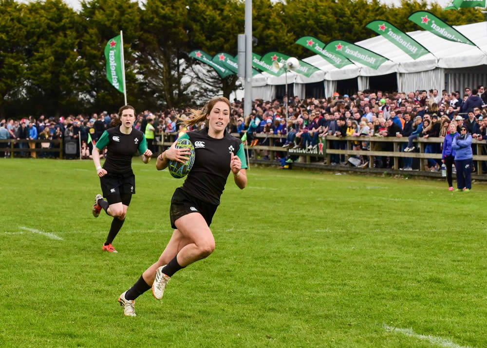 Female Rugby 7s Player Scoring a Try